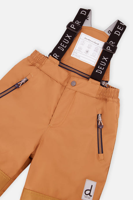 Deux par Deux boys' PLAY snowsuit with navy blue jacket and brown snow pants, further studio view