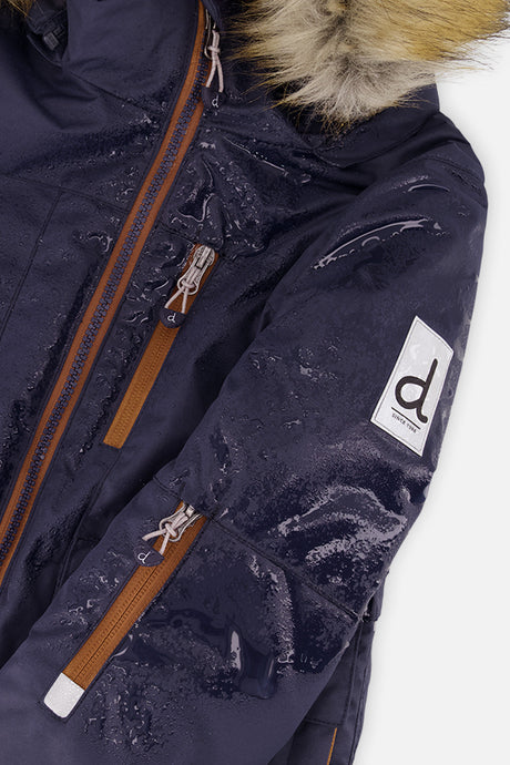 Deux par Deux boys' PLAY snowsuit with navy blue jacket and brown snow pants, additional studio angle