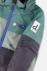 Close-up of the green and navy PLAY jacket front zipper, chest pocket and sleeve logo patch
