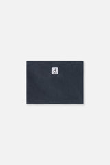 Polar fleece neckwarmer included with the green and navy Deux par Deux PLAY snowsuit