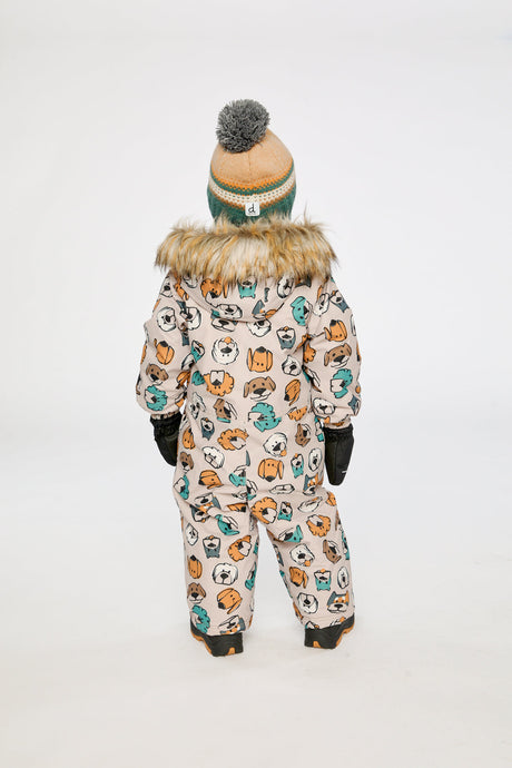 Baby wearing the beige snowsuit with dog print, lookbook image