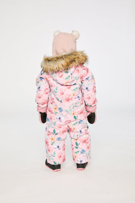 Child wearing Deux par Deux pink floral one-piece car seat snowsuit, view 6