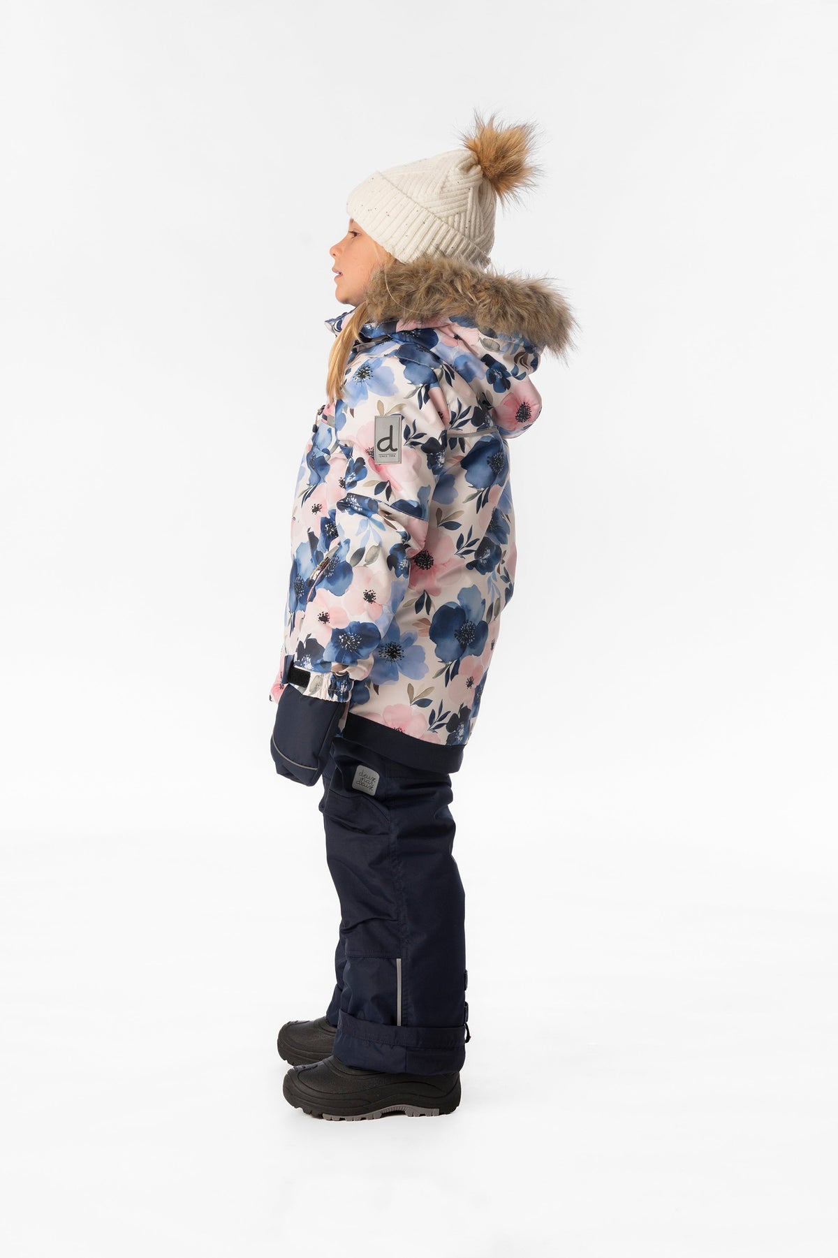 Child wearing the Deux par Deux PLAY snowsuit in watercolor flower print, lookbook view 2
