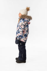 Child wearing the Deux par Deux PLAY snowsuit in watercolor flower print, lookbook view 2