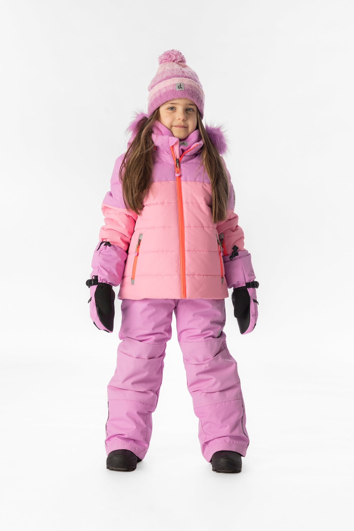 Child wearing the pinkish violet Deux par Deux PLAY snowsuit, lookbook view 1