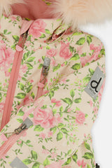 Close-up of the pink roses and green leaves on the beige Deux par Deux PLAY snowsuit with logo patch