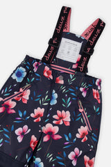 Deux par Deux girls' PLAY snowsuit, pink colorblock and floral print, further studio view