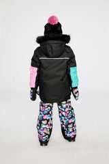 Child wearing the Deux par Deux PLAY heart print snowsuit, third lookbook photo