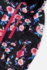 Deux par Deux girls' PLAY two-piece snowsuit in black rose print, additional studio angle