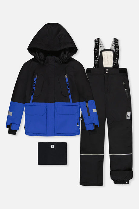 Deux par Deux boys' TEKNIK two-piece snowsuit in royal blue and red, front view