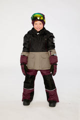 Child wearing the black, beige and burgundy Deux par Deux TEKNIK snowsuit, lookbook view