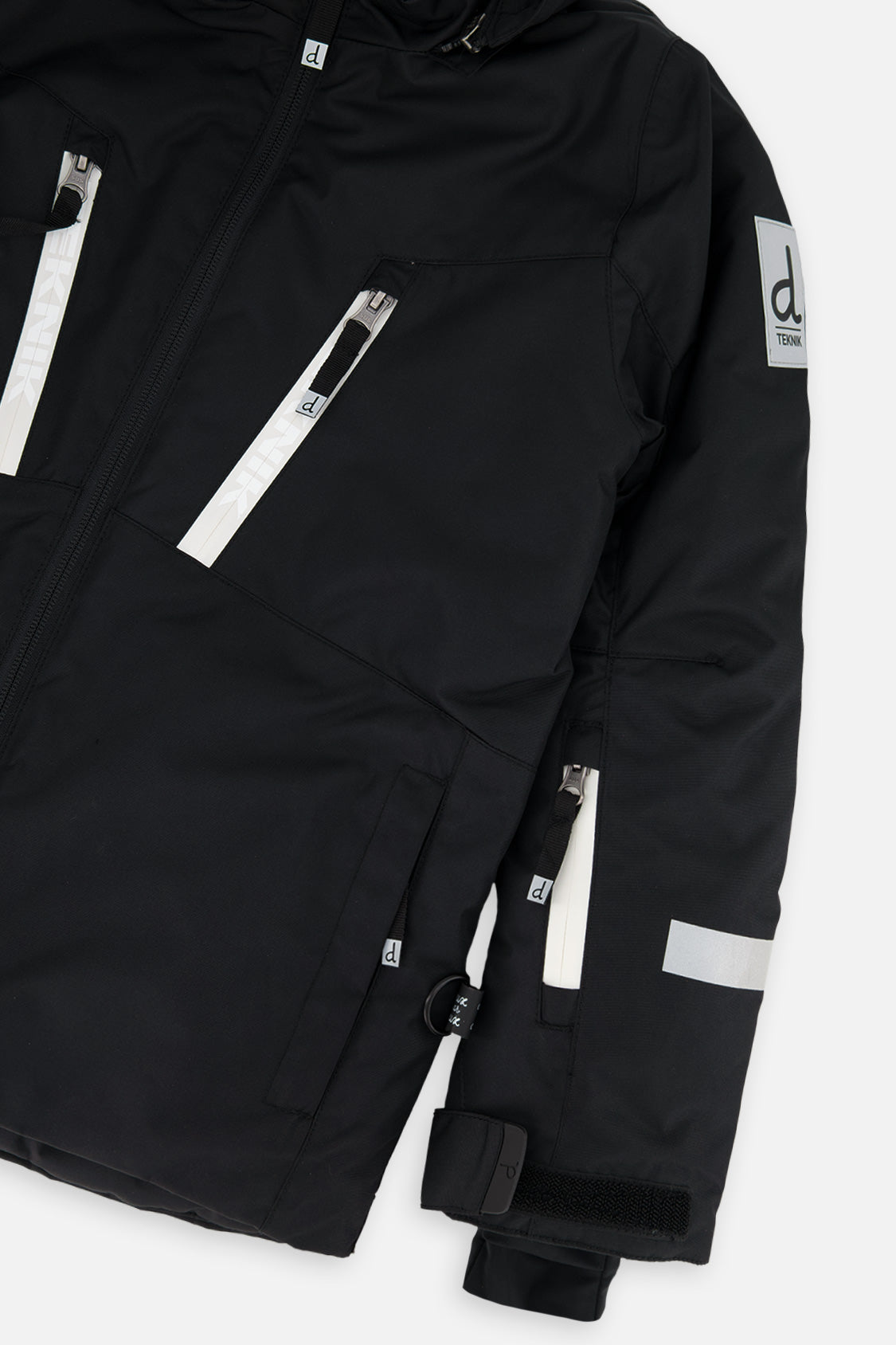 Deux par Deux boys' TEKNIK snowsuit with black jacket and white checkered snow pants, additional studio angle