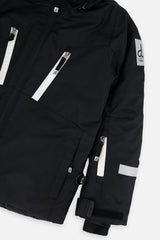 Deux par Deux boys' TEKNIK snowsuit with black jacket and white checkered snow pants, additional studio angle