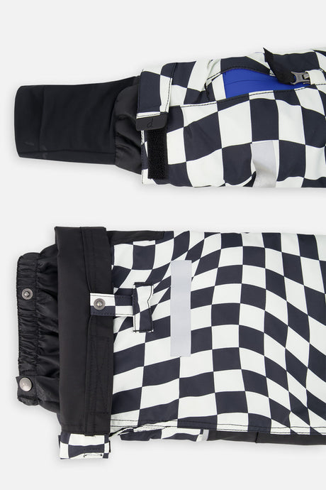 Grow-with-me sleeve extension and adjustable hem on the checkered TEKNIK snowsuit