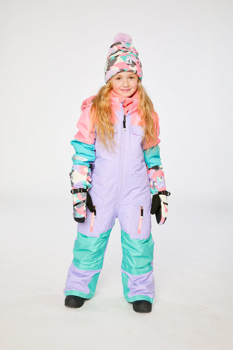Child wearing the lavender, turquoise and orange Deux par Deux Teknik one-piece snowsuit, lookbook photo 1