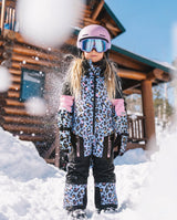 Deux par Deux girls' TEKNIK one-piece snowsuit in blue leopard print – lifestyle photo