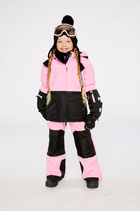 Child wearing the pink Deux par Deux Teknik jacket and snow pants, lookbook photo 1