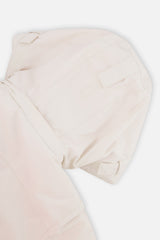Deux par Deux girls' TEKNIK two-piece snowsuit in off-white and pink, further studio view