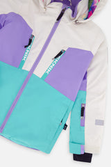 Close-up of the chest zip pockets and sleeve on the color-block TEKNIK jacket