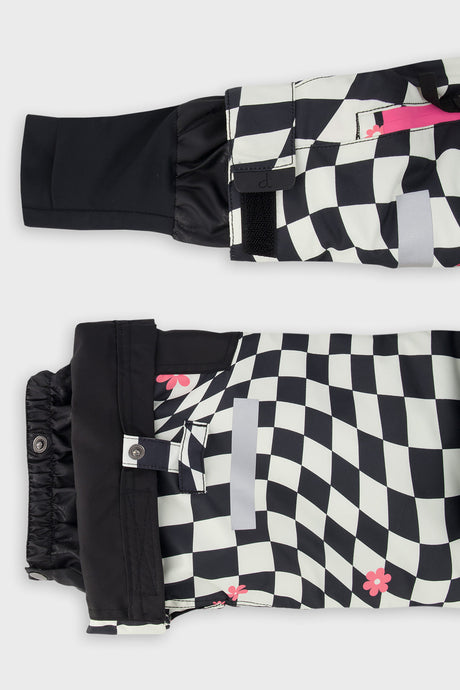 Deux par Deux girls' TEKNIK two-piece snowsuit in white and bright pink checkered print, another product angle