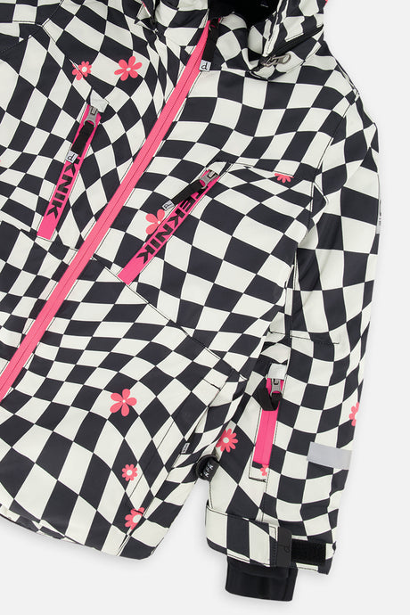 Deux par Deux girls' TEKNIK two-piece snowsuit in white and bright pink checkered print, additional studio angle