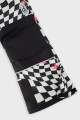 Deux par Deux girls' TEKNIK two-piece snowsuit in white and bright pink checkered print, extra product view