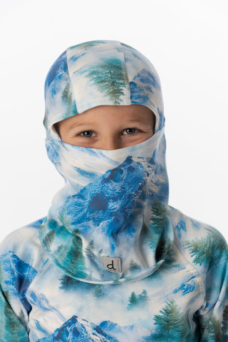 Child wearing the Deux par Deux blue mountain print polar fleece balaclava