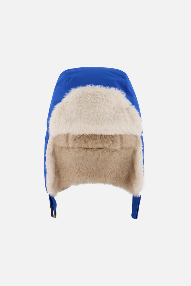 Blue Deux par Deux lined chapka trapper hat with cream plush inside the flaps, flat lay front view