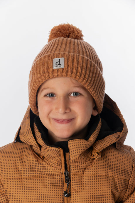 Deux par Deux kids' knit pompom hat in brown – worn by a child