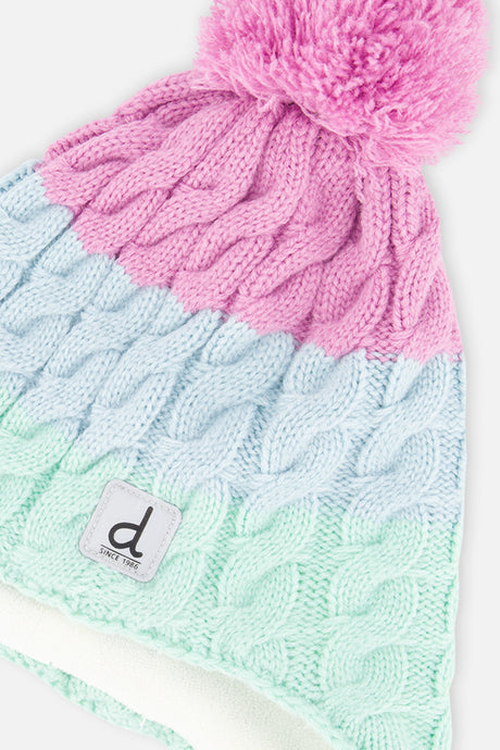 Close-up of the cable-knit colour blocks, pompom and square label on the mint, light blue and violet Deux par Deux hat
