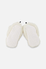 Deux par Deux off-white fuzzy baby slippers with cotton lining, back view