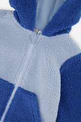 Close-up of the sherpa texture, zipper and hood on the Deux par Deux two-tone blue baby jacket