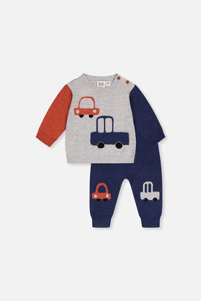 Deux par Deux baby knit set with a grey car sweater with navy and orange sleeves and navy pants, flat lay front view