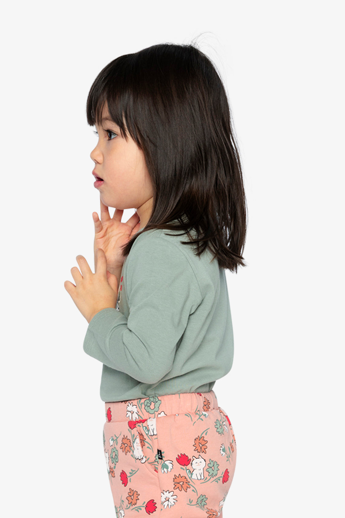 Child wearing the sage green organic cotton long sleeve t-shirt, view 6