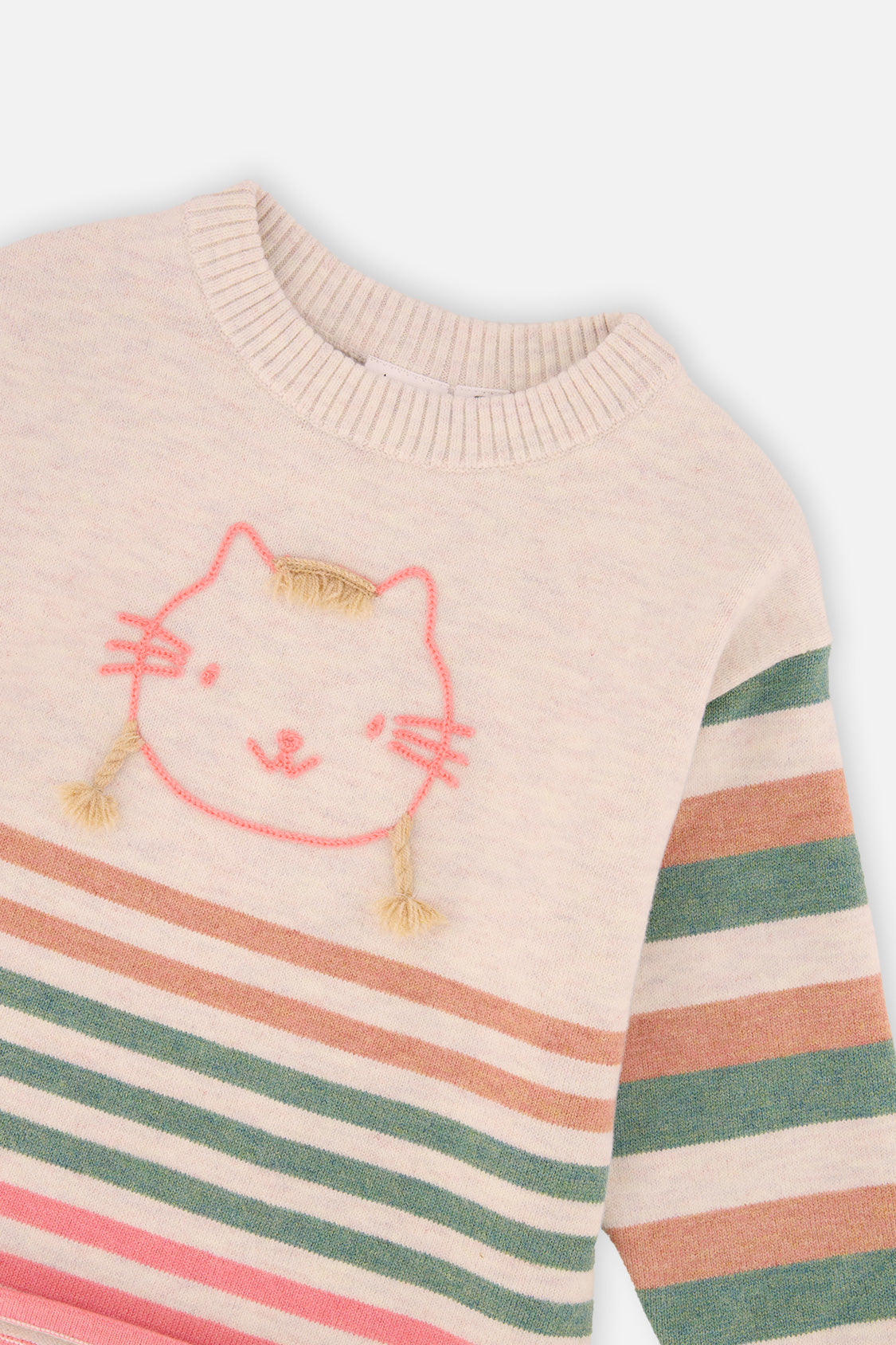 Close-up of the pink outlined cat with tan yarn braids and the ribbed collar on the off-white Deux par Deux sweater