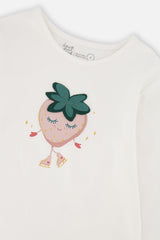 Close-up of the textured strawberry character on ice skates on the off-white T-shirt