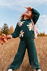 Child wearing the jasper printed green knit flare pants, view 6