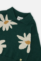 Close-up of the shirt collar and the cream daisy jacquard on the dark green Deux par Deux knit sweater