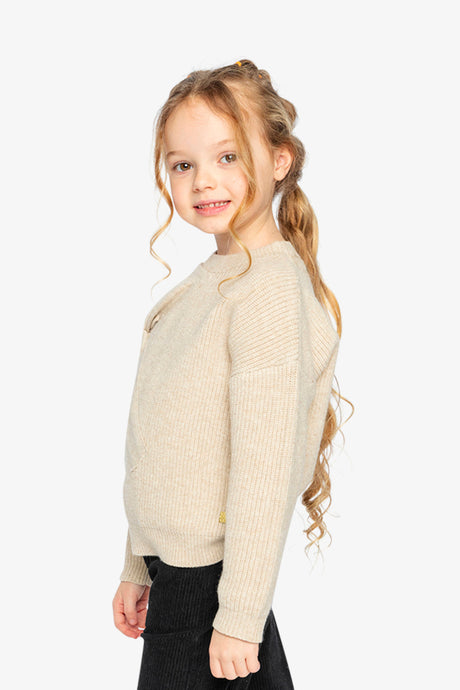 Child wearing the beige Deux par Deux ribbed sweater, side view