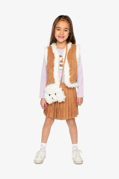 Child in a full Poodle Chic outfit with the reversible vest