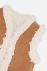 Close-up of the Deux par Deux reversible vest in brown and cream