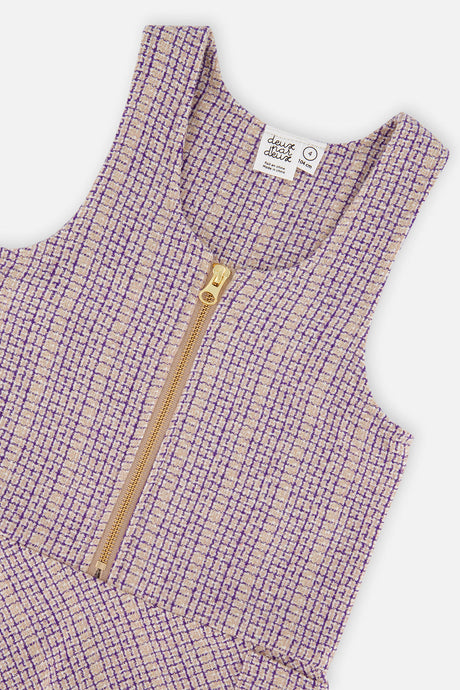 Close-up of the front zipper and checkered fabric on the Deux par Deux purple jumper dress