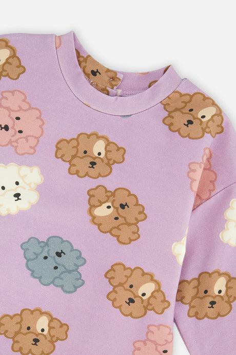 Close-up of the poodle face print and ribbed neckline on the Deux par Deux lilac dress