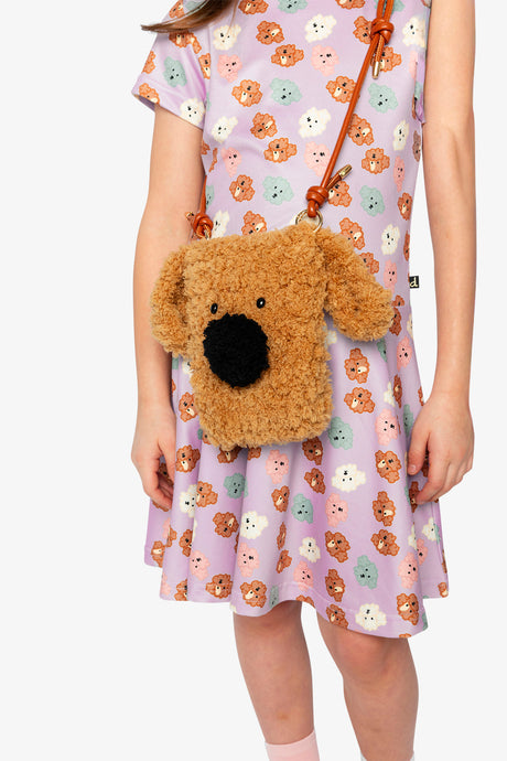 Child wearing the brown poodle crossbody bag, view 2
