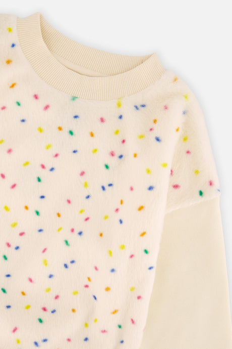 Close-up of the multicolour confetti faux fur panel on the Deux par Deux off-white sweatshirt