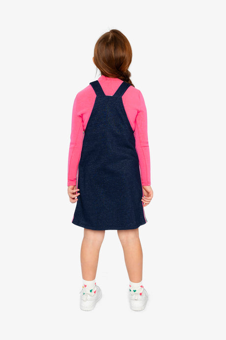 Child wearing the Deux par Deux navy overall dress, back view