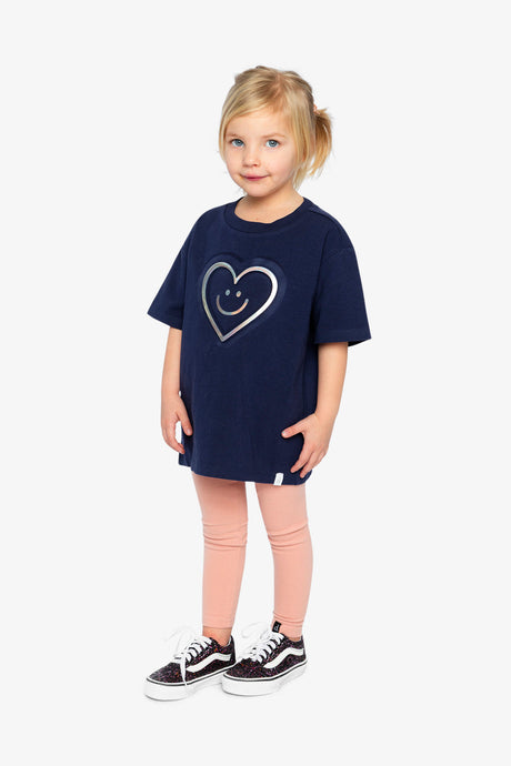 Deux par Deux girls' dark blue jersey T-shirt with holographic heart – full-length look on a child model