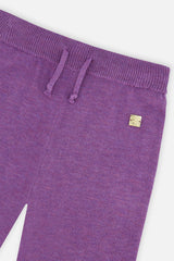 Close-up of the ribbed knit waistband on the violet wide leg pants