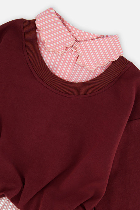 Close-up of the scalloped pink striped collar and the burgundy ribbed neckline on the Deux par Deux sweatshirt