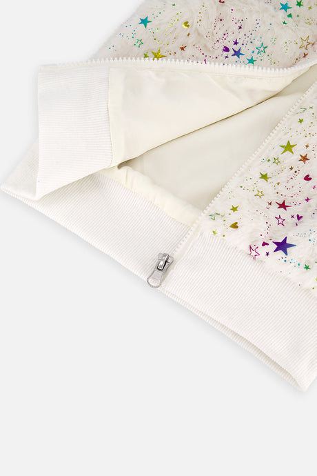 Open zipper on the star print faux fur vest showing the lining and ribbed hem, flat close-up